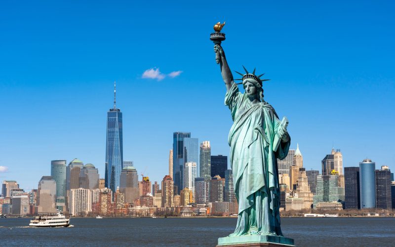 The,Statue,Of,Liberty,Over,The,Scene,Of,New,York