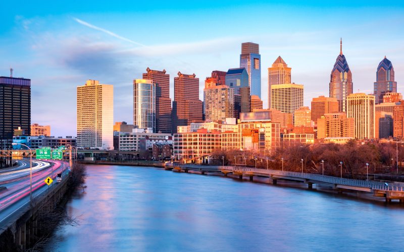Late,Afternoon,In,Philadelphia.,The,Skyline,Glows,Under,An,Orange