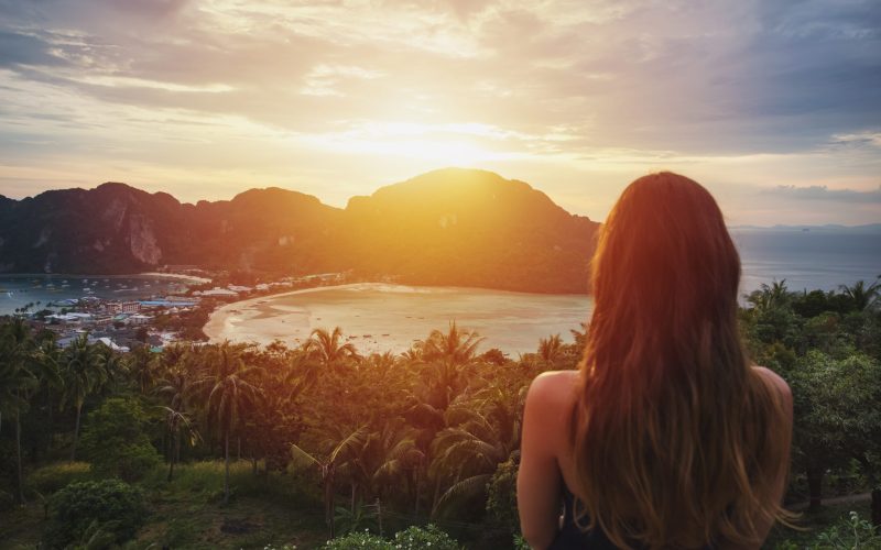 A,Girl,Admiring,Amazing,Sunset,On,Phi,Phi,Island.,View